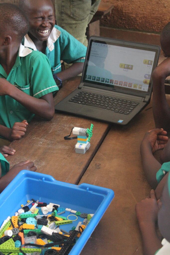 Children building a robot